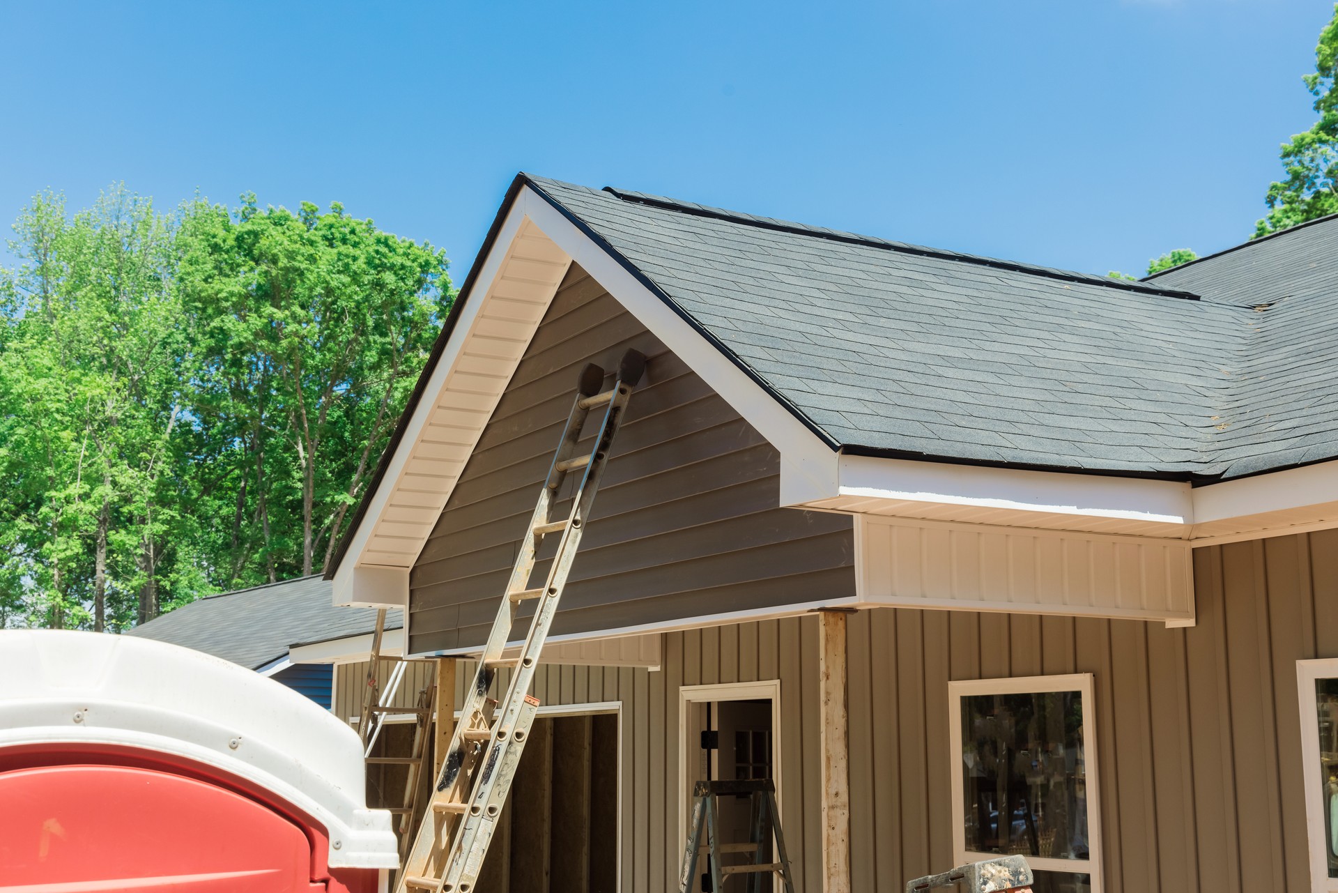 Roof shingles in top the on new home under construction site